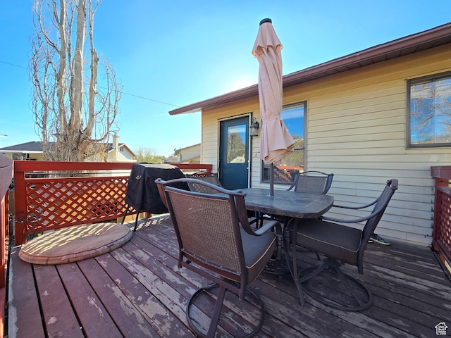 243 Downs Cir, Ogden, UT 84404 - deck featuring outdoor dining area and area for grilling