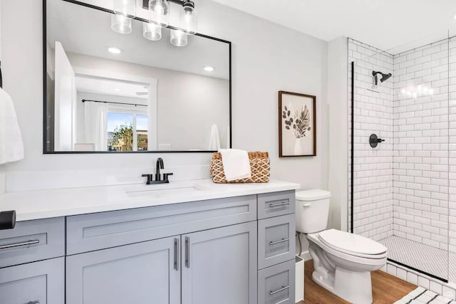 875 W Akoya Pearl St S Unit 101-B, St George, UT 84790 - bathroom featuring toilet, a shower stall, vanity, and recessed lighting