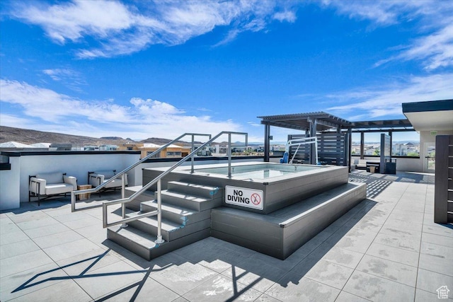 875 W Akoya Pearl St S Unit 101-B, St George, UT 84790 - view of patio / terrace with a hot tub and a pergola