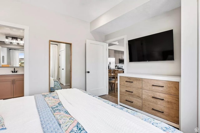 875 W Akoya Pearl St S Unit 101-B, St George, UT 84790 - bedroom with a sink, stainless steel refrigerator with ice dispenser, and connected bathroom