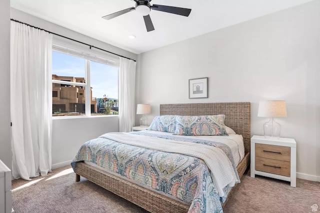 875 W Akoya Pearl St S Unit 101-B, St George, UT 84790 - bedroom with carpet flooring, baseboards, and ceiling fan