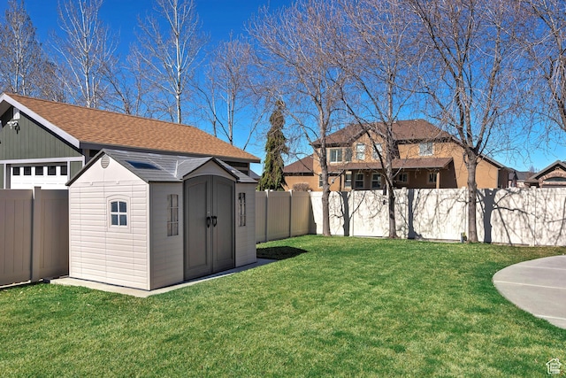 3173 N 1050 W, Pleasant View, UT 84414 - view of yard with a fenced backyard, an outbuilding, and a storage shed