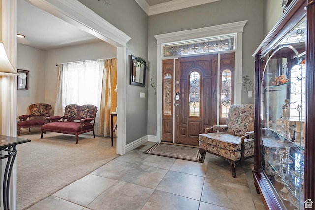3173 N 1050 W, Pleasant View, UT 84414 - entrance foyer featuring baseboards, ornamental molding, light tile patterned flooring, and light carpet
