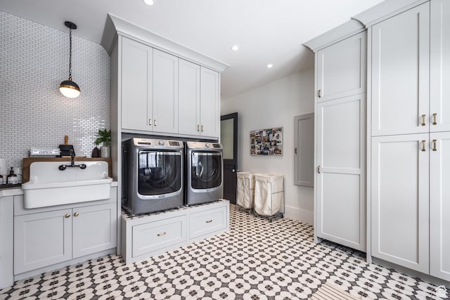 1230 S Eaglenest Dr, Woodland Hills, UT 84653 - laundry area featuring washer and clothes dryer, cabinet space, baseboards, recessed lighting, and light flooring