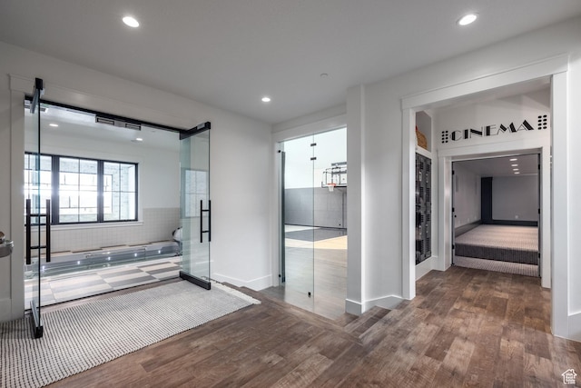 1230 S Eaglenest Dr, Woodland Hills, UT 84653 - bathroom with wood finished floors, a bath, recessed lighting, and baseboards