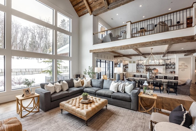 1230 S Eaglenest Dr, Woodland Hills, UT 84653 - living room featuring wood finished floors, beam ceiling, healthy amount of natural light, a high ceiling, and recessed lighting