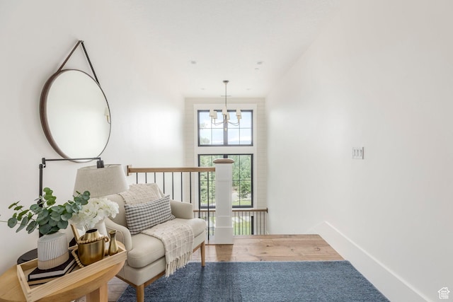 1230 S Eaglenest Dr, Woodland Hills, UT 84653 - sitting room featuring a chandelier, baseboards, and wood finished floors