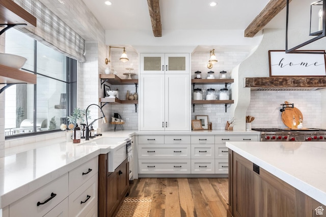 1230 S Eaglenest Dr, Woodland Hills, UT 84653 - kitchen with open shelves, beam ceiling, backsplash, light countertops, and white cabinetry