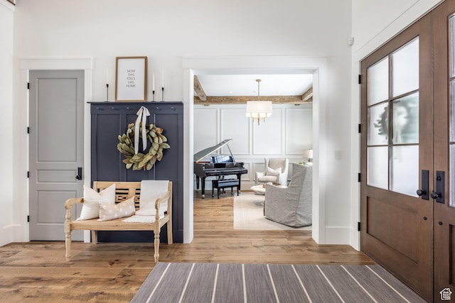 1230 S Eaglenest Dr, Woodland Hills, UT 84653 - foyer entrance with wood finished floors and a decorative wall