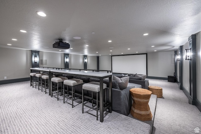 1230 S Eaglenest Dr, Woodland Hills, UT 84653 - cinema room with light carpet, baseboards, recessed lighting, a dry bar, and a textured ceiling