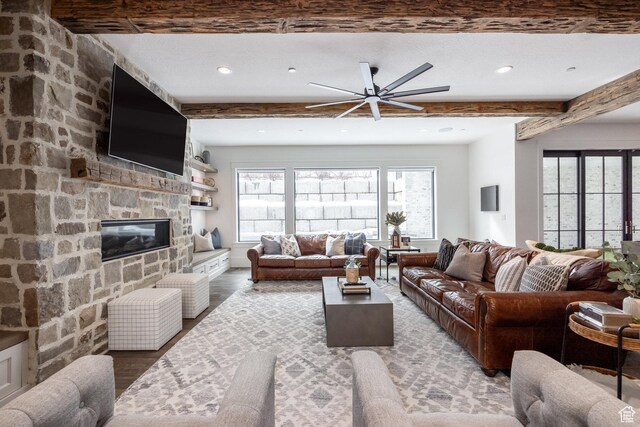 1230 S Eaglenest Dr, Woodland Hills, UT 84653 - living room featuring a ceiling fan, beamed ceiling, light wood finished floors, a fireplace, and recessed lighting