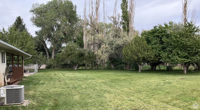 430 E Canyon Rd, Fillmore, UT 84631 - view of yard featuring central AC and fence
