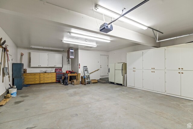 430 E Canyon Rd, Fillmore, UT 84631 - garage with freestanding refrigerator and a garage door opener