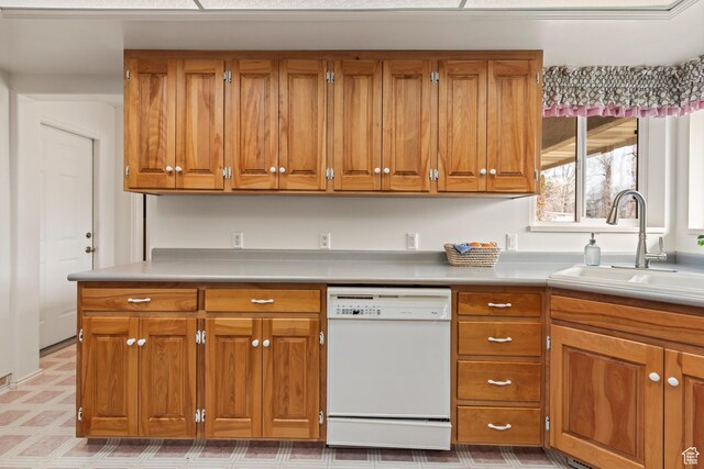 430 E Canyon Rd, Fillmore, UT 84631 - kitchen featuring light countertops, a sink, white dishwasher, and brown cabinetry