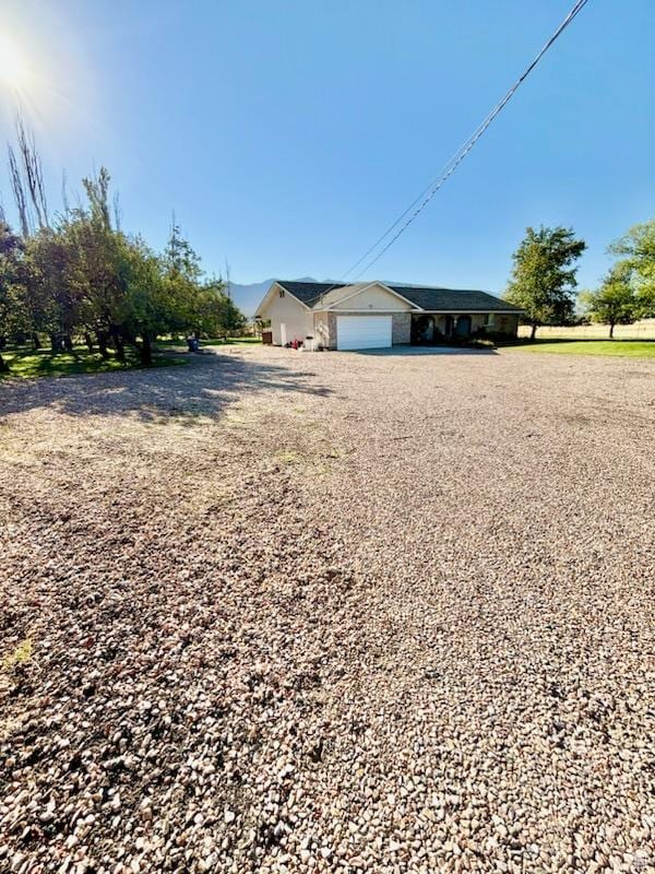 430 E Canyon Rd, Fillmore, UT 84631 - view of front of home featuring driveway and an attached garage