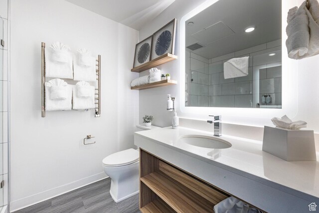 2670 W Canyons Resort Dr Unit 437, Park City, UT 84098 - bathroom with baseboards, toilet, vanity, and a shower with shower door