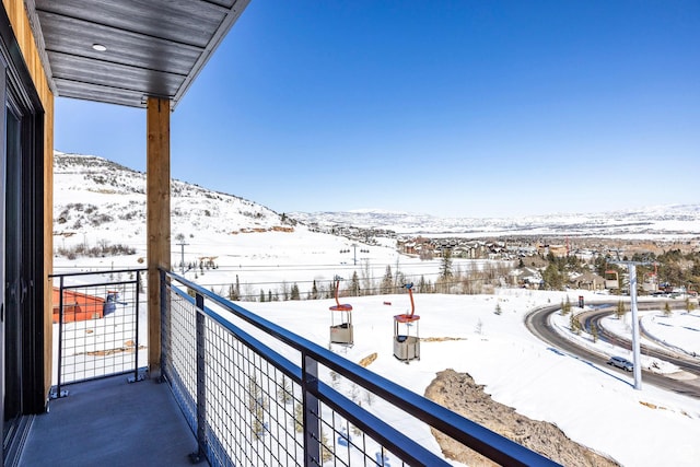 2670 W Canyons Resort Dr Unit 437, Park City, UT 84098 - snow covered back of property with a mountain view