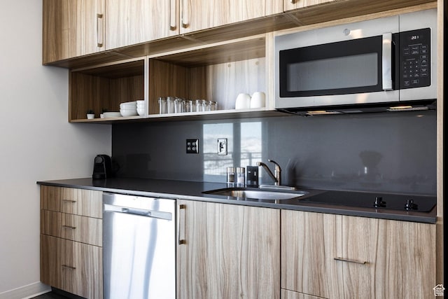 2670 W Canyons Resort Dr Unit 437, Park City, UT 84098 - kitchen featuring light brown cabinets, modern cabinets, a sink, and stainless steel appliances