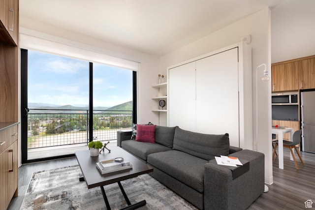 2670 W Canyons Resort Dr Unit 437, Park City, UT 84098 - living room with wood finished floors and a mountain view