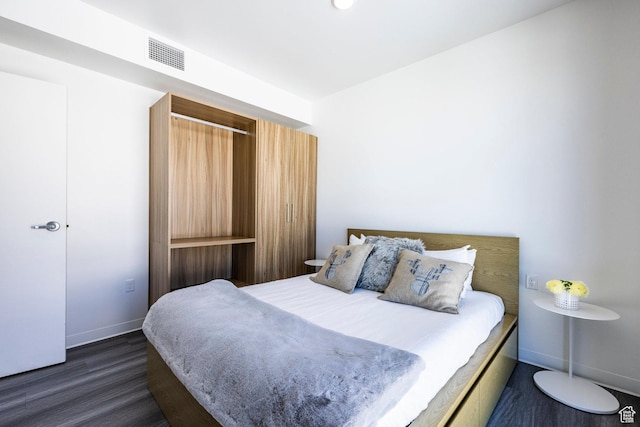 2670 W Canyons Resort Dr Unit 437, Park City, UT 84098 - bedroom featuring baseboards, visible vents, and dark wood-type flooring
