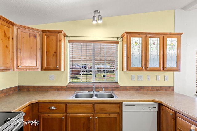 180 N 1100 E Unit 165, Washington, UT 84780 - kitchen with light countertops, a sink, white dishwasher, brown cabinetry, and electric range