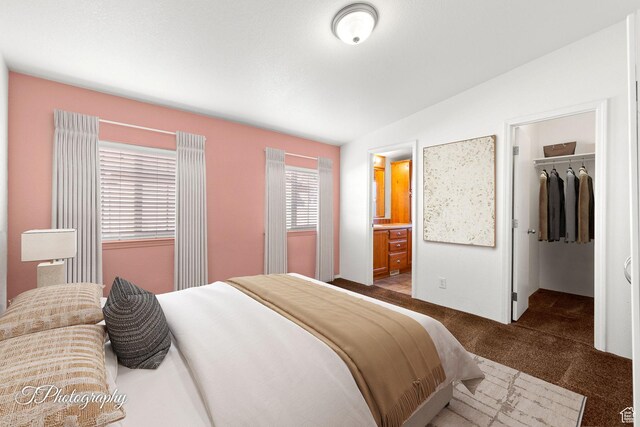 180 N 1100 E Unit 165, Washington, UT 84780 - carpeted bedroom with a closet, ensuite bath, vaulted ceiling, and a walk in closet