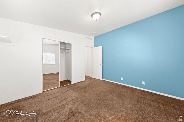 180 N 1100 E Unit 165, Washington, UT 84780 - unfurnished bedroom featuring visible vents, a closet, and carpet