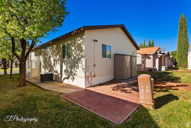 180 N 1100 E Unit 165, Washington, UT 84780 - back of house with a patio area, central AC, and a yard