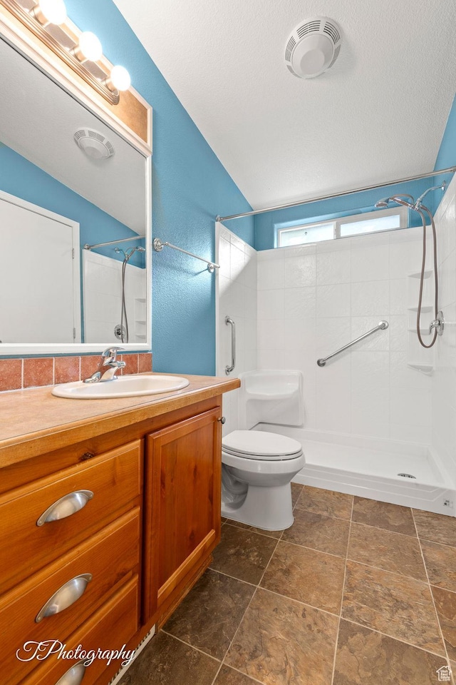 180 N 1100 E Unit 165, Washington, UT 84780 - bathroom with toilet, vanity, a textured ceiling, walk in shower, and visible vents