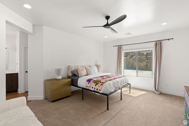 bedroom featuring recessed lighting, baseboards, light colored carpet, and visible vents
