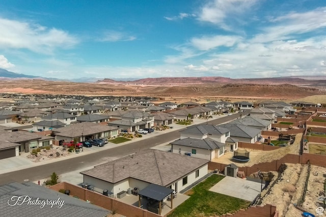 bird's eye view with a residential view and a mountain view