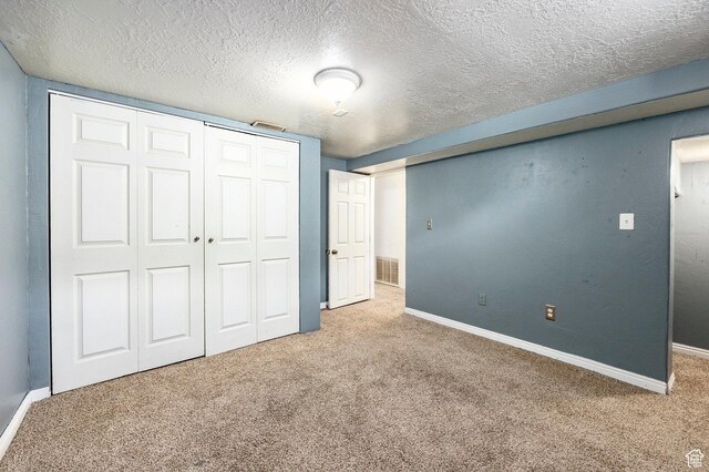 1150 W Girard Ave, Salt Lake City, UT 84116 - unfurnished bedroom featuring carpet floors, baseboards, a closet, and visible vents
