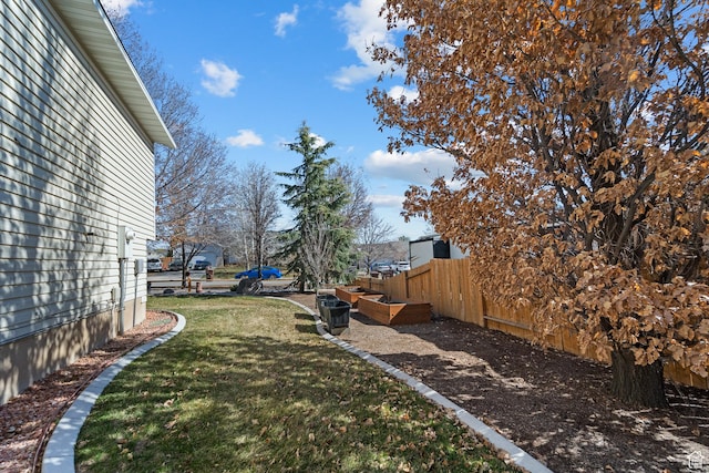 view of yard featuring fence