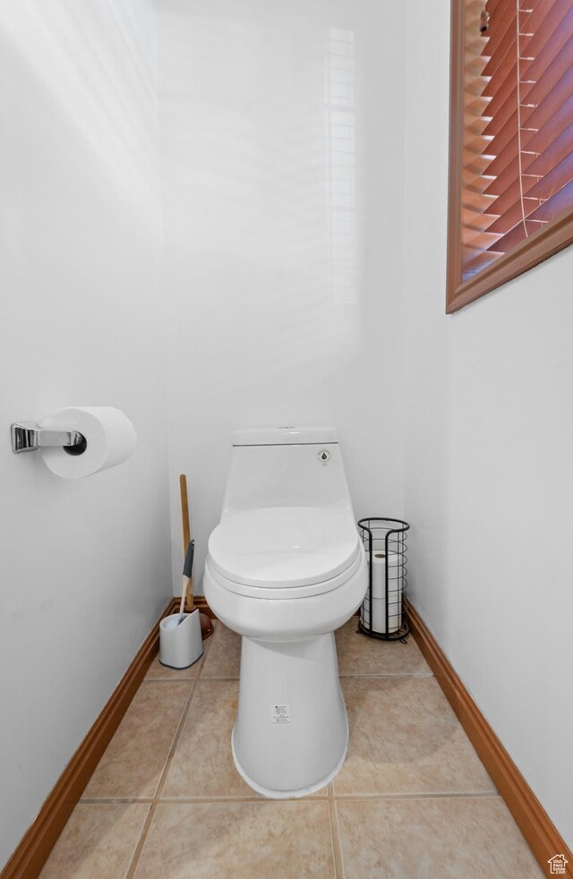 18509 Jefferson Ave, Eagle Mountain, UT 84013 - bathroom featuring tile patterned flooring, toilet, and baseboards