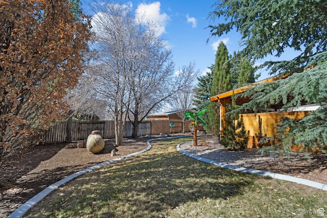view of yard featuring fence