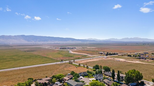 18509 Jefferson Ave, Eagle Mountain, UT 84013 - aerial view of property's location featuring a mountain backdrop and rural landscape