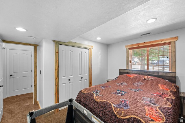 18509 Jefferson Ave, Eagle Mountain, UT 84013 - carpeted bedroom featuring recessed lighting, a closet, baseboards, and a textured ceiling
