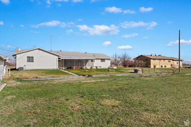 615 S 5900 W, Ogden, UT 84404 - view of yard with cooling unit and a sunroom