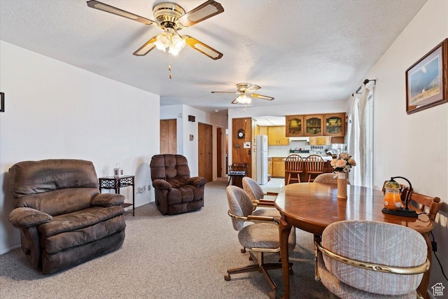 615 S 5900 W, Ogden, UT 84404 - carpeted dining area featuring a textured ceiling and a ceiling fan