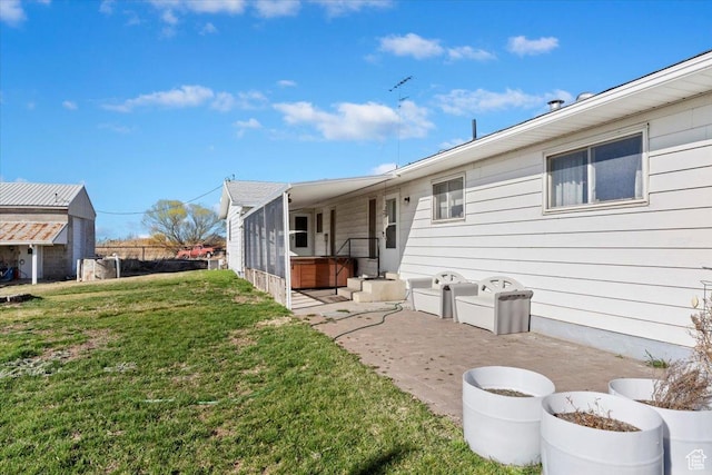 615 S 5900 W, Ogden, UT 84404 - back of property with a lawn and a hot tub