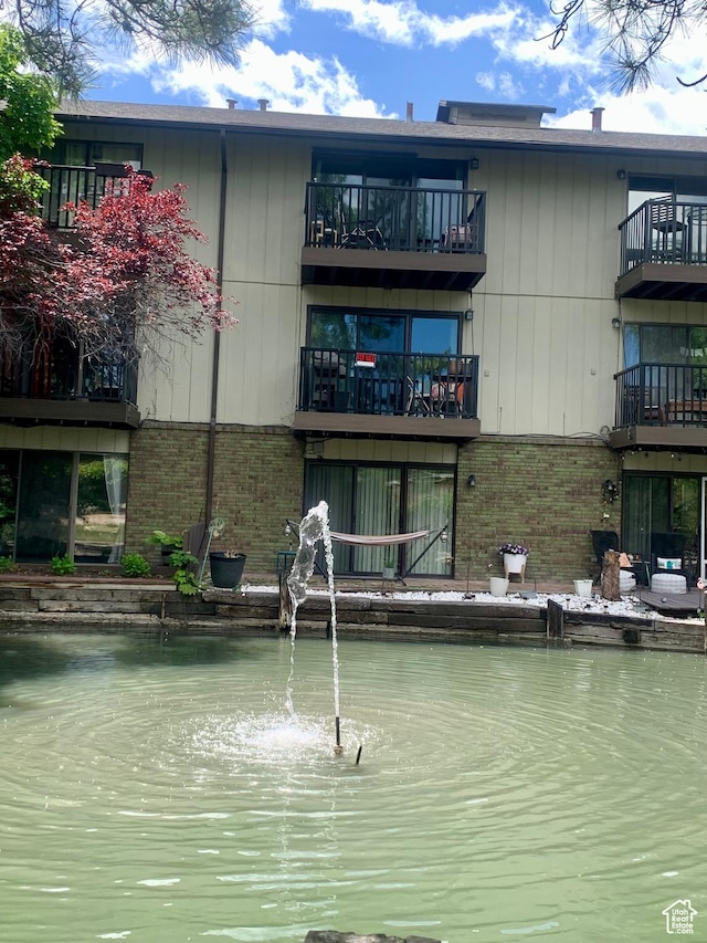 4759 S Pintail Ct, Salt Lake City, UT 84117 - view of building exterior featuring a water view