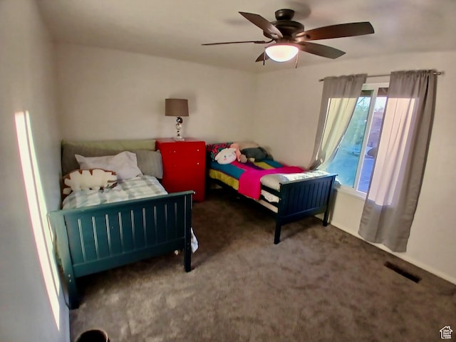 4759 S Pintail Ct, Salt Lake City, UT 84117 - carpeted bedroom with a ceiling fan