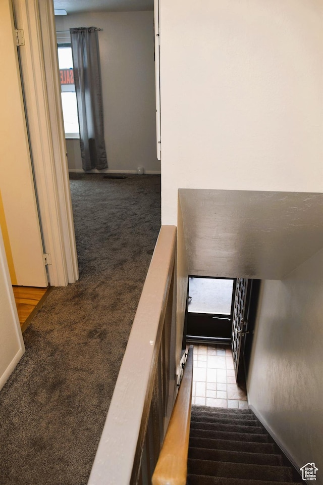 4759 S Pintail Ct, Salt Lake City, UT 84117 - staircase with carpet floors and baseboards