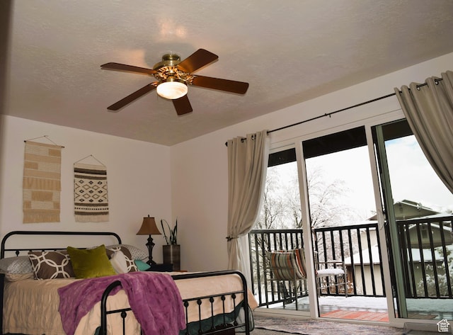 4759 S Pintail Ct, Salt Lake City, UT 84117 - bedroom featuring access to exterior, a textured ceiling, and a ceiling fan