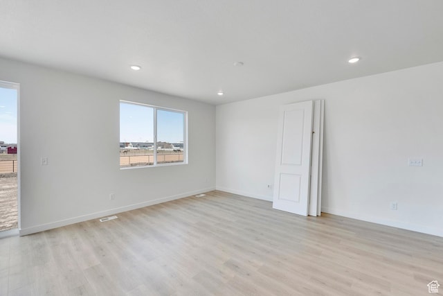 2156 S 4140 W Unit 69, Taylor, UT 84401 - spare room featuring baseboards, recessed lighting, and light wood-style floors
