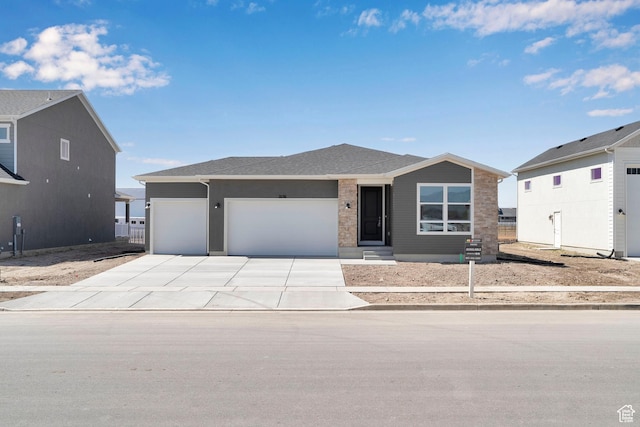 2156 S 4140 W Unit 69, Taylor, UT 84401 - single story home with driveway and an attached garage