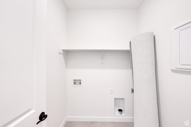 2156 S 4140 W Unit 69, Taylor, UT 84401 - laundry area with hookup for an electric dryer, light tile patterned flooring, washer hookup, laundry area, and baseboards