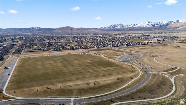 birds eye view of property featuring a mountain view
