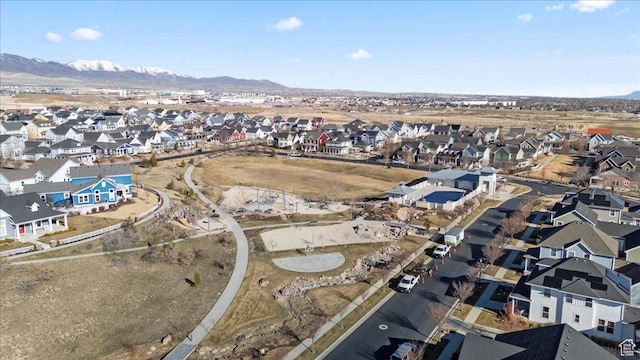 drone / aerial view featuring a mountain view and a residential view