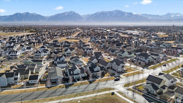 drone / aerial view with a residential view and a mountain view